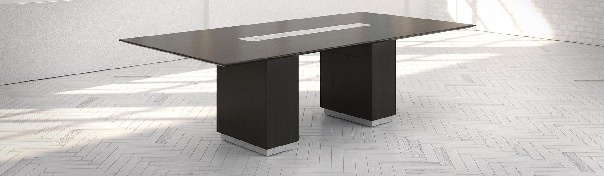 Tailgate table in a boardroom with dark woodgrain finish
