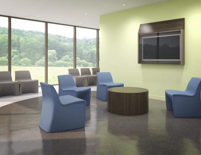 Spec Furniture Hardi Lounge Chair in environment, blue chair, yellow wall, activity room